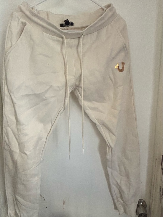 True Religion Pants - True Religion Men’s Cream Sweatpants with Gold Logo has couple stains easy Oxi